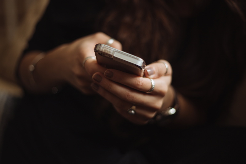 holding, manicure, hand, text, woman, midsection, ring, adults only, adult, 5K, danger, indoors, smart phone, message, close-up, handgun, technology, selective