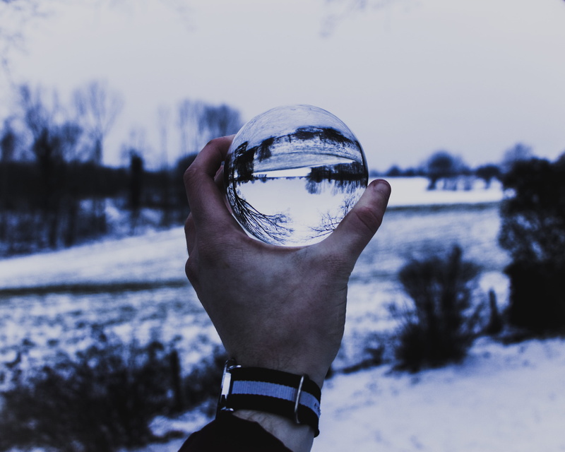 holding, accessories, ball, sunglasses, human, winter, accessory, real people, cold temperature, belgium, watch, season, hand, crystal ball, bubble, unrecognizable person