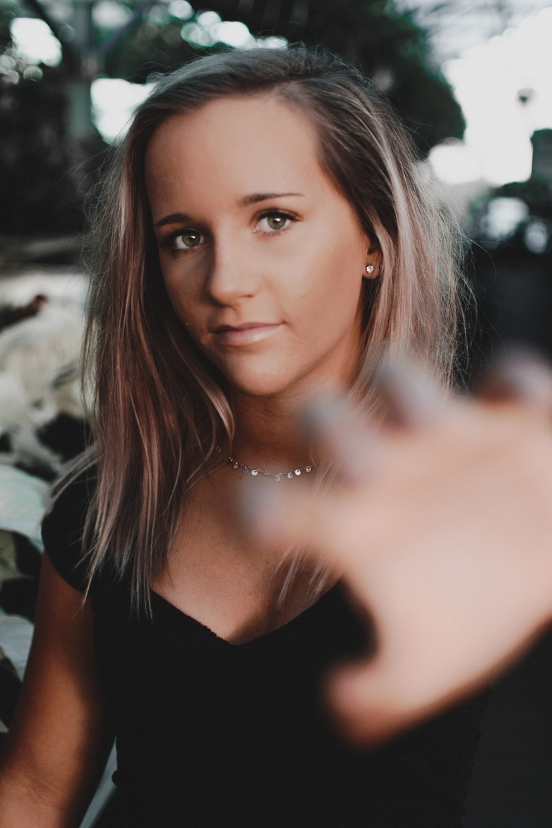 robe, beauty, top, clothing, person, jewelry, front view, looking at camera, mouth, hand, diamond, real people, photography, gemstone, woman, brown hair