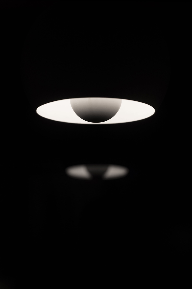 indoors, lamp, brake, ceiling light, fire, black background, cylinder, black, lighting equipment, light - natural phenomenon, white, 5K, jewelry, technology