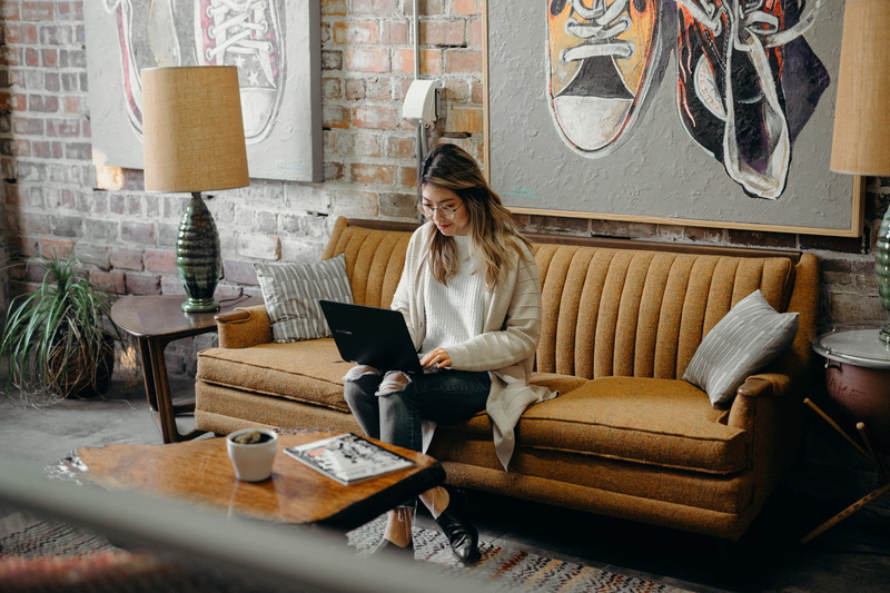 young adult, casual clothing, indoors, apparel, wood, young women, wireless technology, home decor, room, lifestyles, computer, women, communication, table