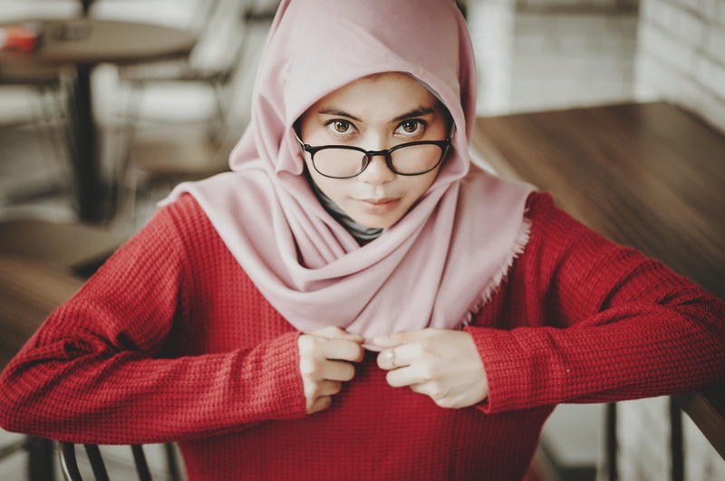 real people, selective, photo, clothing, indoors, human, female, girl, 4K, hijab, person, front view, hood, scarf, face, pink, headshot, one person, lifestyles
