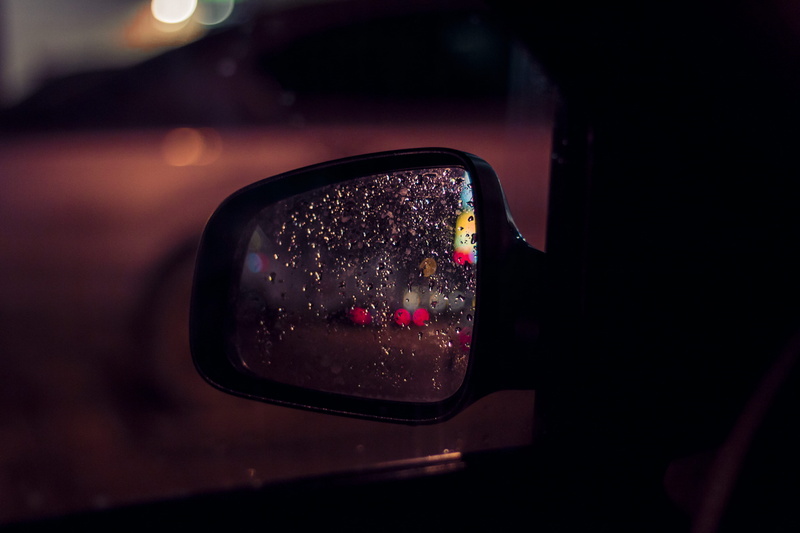 vehicle interior, red, car interior, wet, canine, car mirror, mirror, photography, glass - material, accessory, dog, sunglasses, mode of transportation