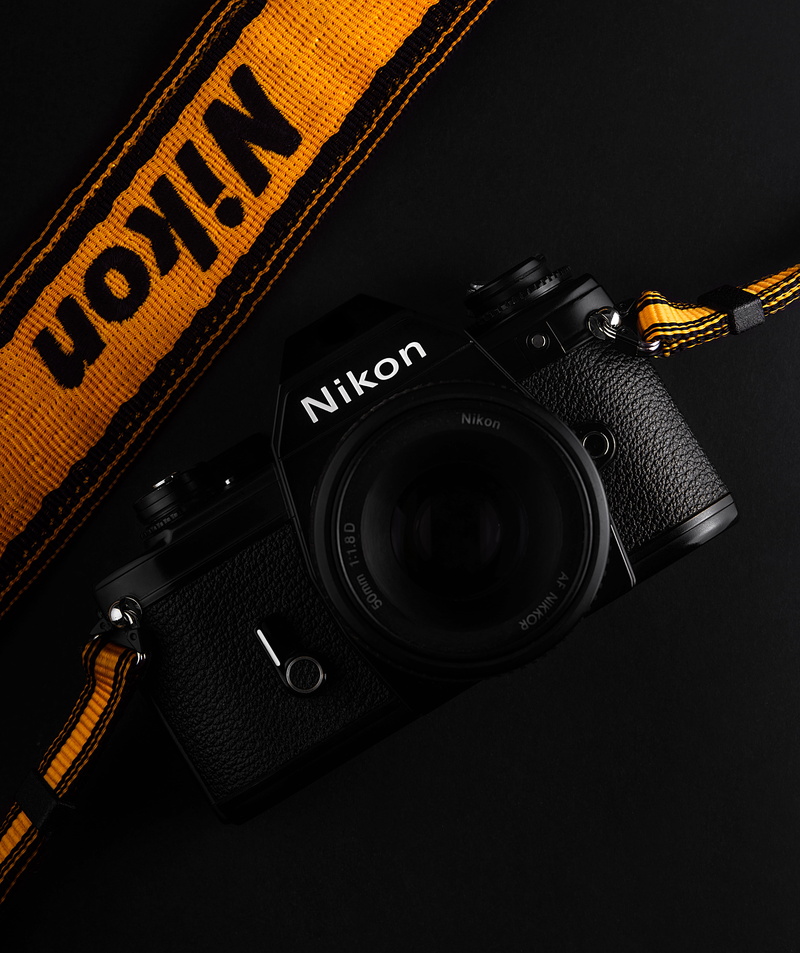 arts culture and entertainment, orange, single object, technology, adapter, music, camera, hardware, camera - photographic equipment, security, safety