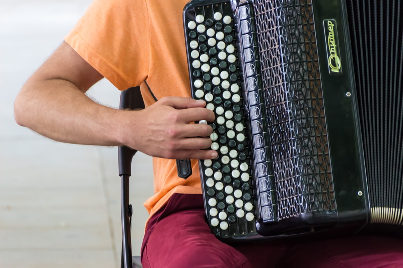 instrument, tradition, human body part, playing, play, music, keyboard instrument, midsection, men, accordion, close-up, human hand, casual clothing, hand