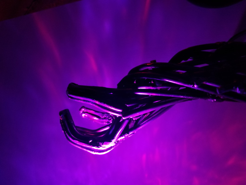 glow, high heels, illuminated, pink color, music, studio shot, 4K, no people, close-up, indoors, steam punk, art, steampunk, single object, fashion, sculpture