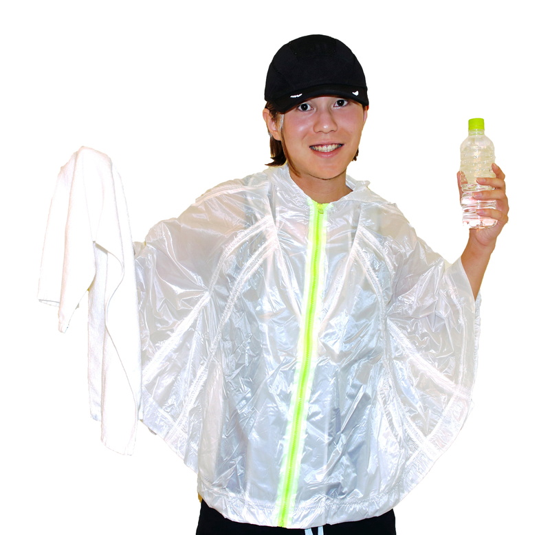 studio shot, smiling, cut out, holding, front view, life style, girls, hat, indoors, running, rain coat, three quarter length, looking at camera, fun, fitness