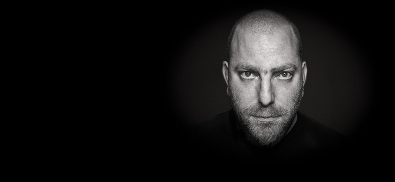 portrait, one person, copy space, human body part, males, men, black background, looking at camera, dark, body part, emotion, ominous, indoors, mature adult