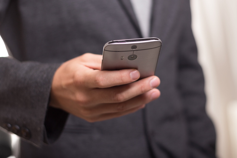 device, post, communication, android, job, manager, holding, equipment, people, contact, close-up, affairs, to call, men, standing, business Person, one person