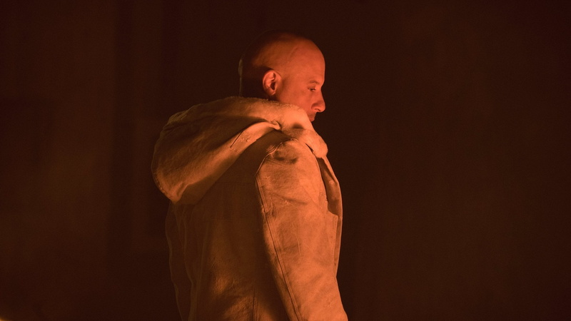 completely bald, standing, males, waist up, side view, shaved head, black background, 2017 movies, copy space, profile view, studio shot, indoors, three quarter length