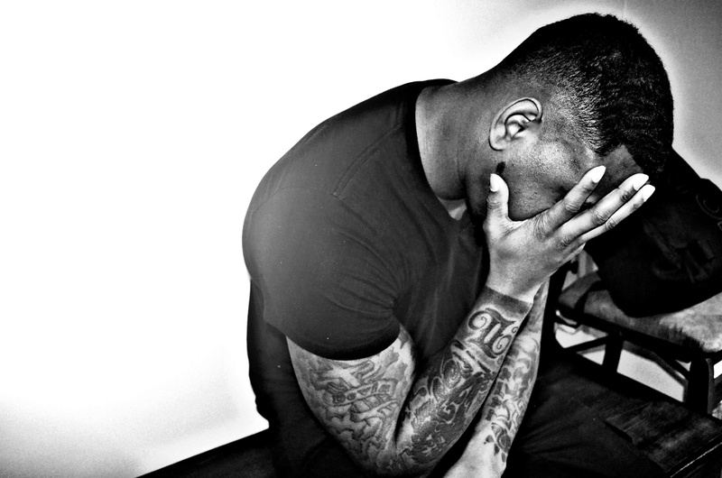 muscles, side view, human face, one person, depression - sadness, fitness, obscured face, casual clothing, sitting, emotion, blackmale, emotional stress