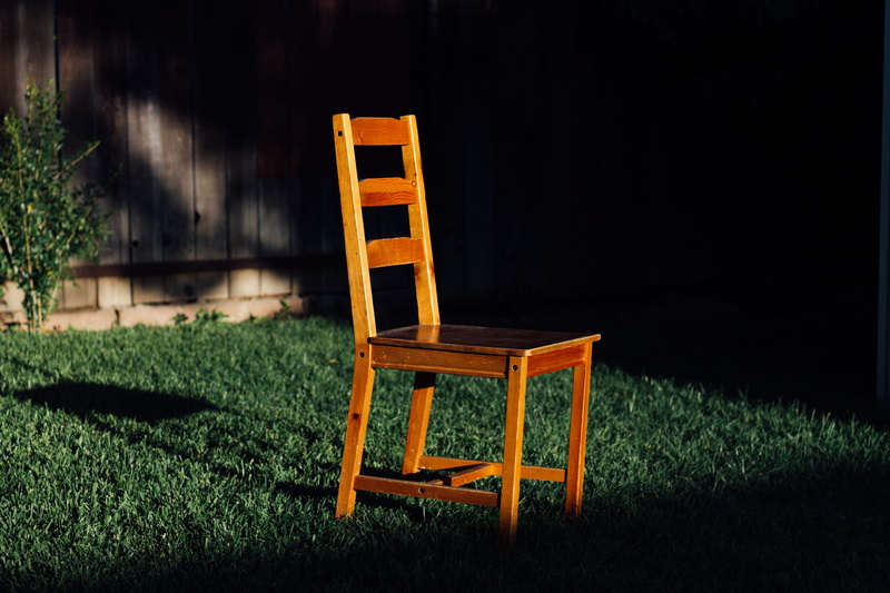 no People, time, day, green Color, field, wood - material, outdoors, grass, wooden chair, shadow, grass lawn, dark, growth, orange, brown, plant, empty