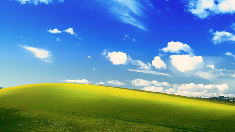 rolling landscape, beauty in nature, green - golf course, microsoft windows ms dos landscape, sky, green color, outdoors, landscape, golf course, grass