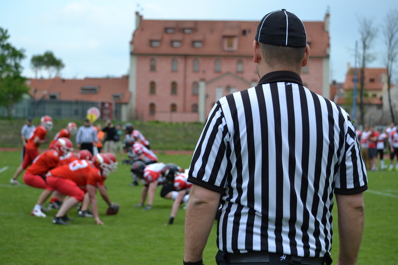 real people, 4K, people, uniform, men, striped, day, incidental people, adult, group of people, sport, referee, architecture, focus on foreground, casual clothing