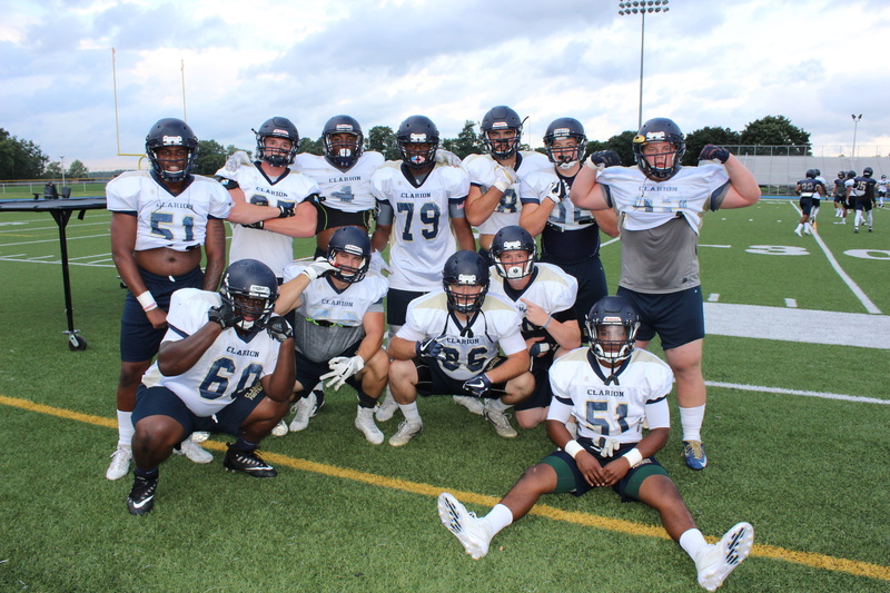 football, uniform, men, group together, football field, squad, huddled, outdoors, quarterback, American football, football players, action, game, sport