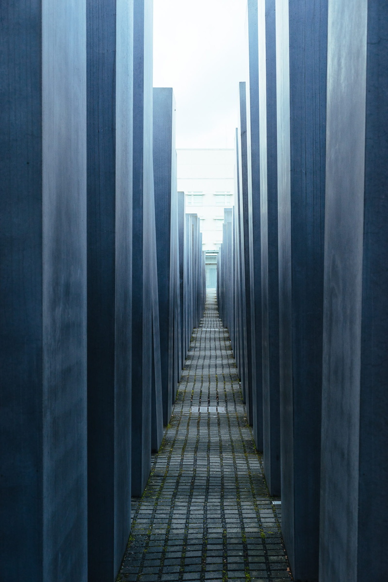 travel destinations, concrete, the past, sky, day, architectural column, memorial, no people, direction, building exterior, holocaust memorial, diminishing perspective