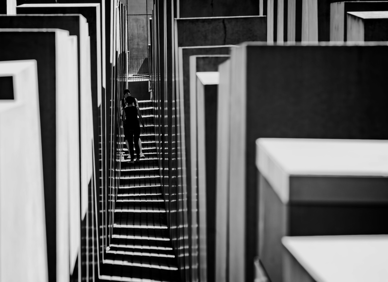 steps and staircases, real people, built structure, direction, convenience, women, banister, the way forward, modern, escalator, one person, solemn, outdoors