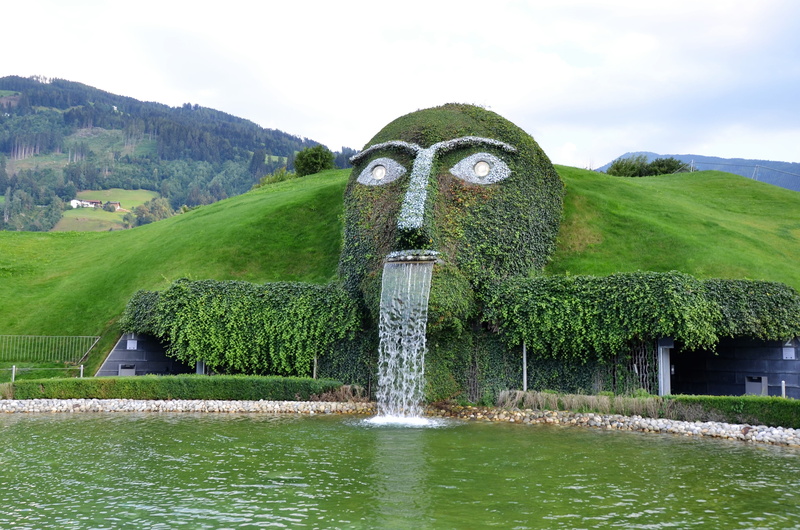 outdoors, 4K, tree, giant head, swarovski giant, nature, lake, grass, swarovski kristallwelten, building exterior, green color, day, water, waterfall