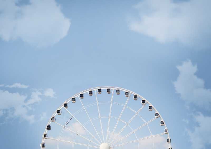 architecture, recreation, leisure, photography, ferris wheel, wheel, leisure activity, shape, bright, fun, sky, blue, semi-circle, no people, ferris, circle