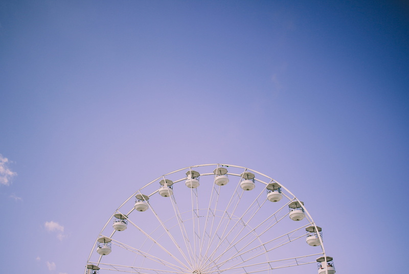 traveling carnival, gray, leisure activity, big wheel, day, amusement park, outdoors, amusement park ride, arts culture and entertainment, carnival, fun