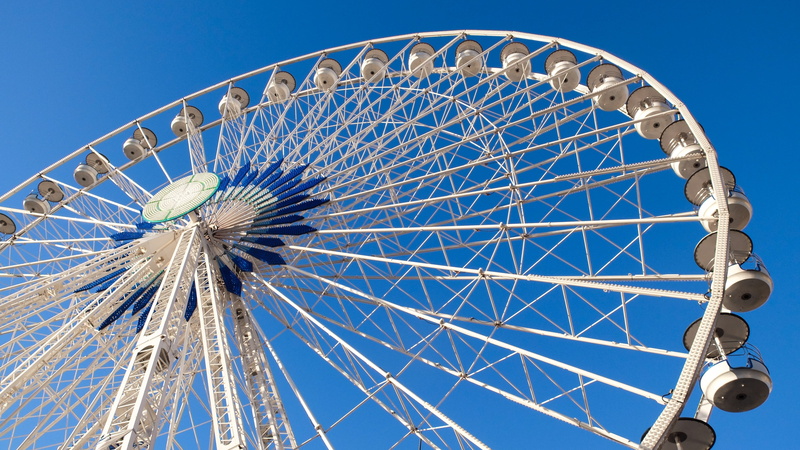wheel, nature, low angle view, semi-circle, fun, arts culture and entertainment, spinning, amusement, traveling carnival, excitement, amusement park, architecture