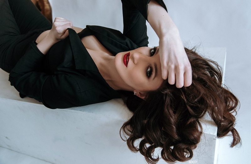 black jackets, red lipstick, brunette, Pasha Karpenko, model, women, jacket, hands in hair, 1080P, holding clothes, pale, lying on back