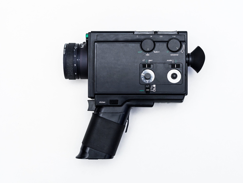 gear, old school, analogue, camera - photographic equipment, hobby, copy space, film camera, old fashion, isolated, classic, film, activity, black color