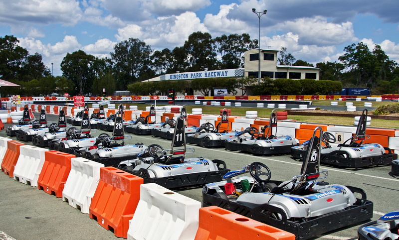 car, land vehicle, outdoors, carting, fast, racing, transportation, speed, motorsport, track, motor racing track, architecture, competitive sport, racer