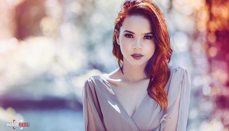 young adult, looking at viewer, glamour, portrait, human face, face, redhead, grey shirt, adult, outdoors, dyed red hair, hair, one person, women, young women