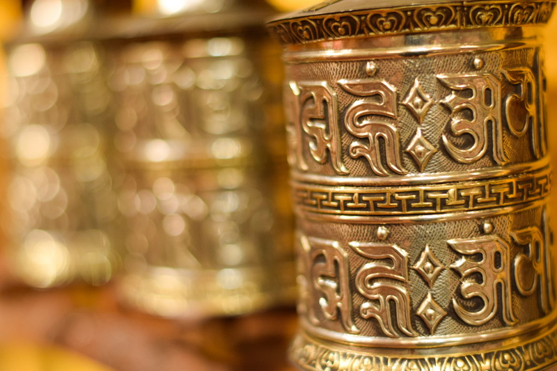 savings, om, indoors, buddhism, no people, bronze - alloy, close-up, gold, backgrounds, spiritual, metal, luxury, shiny, prayer wheel, silver colored, wealth