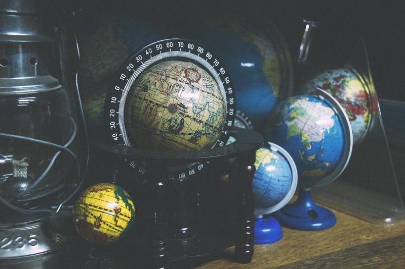 globe, communication, decoration, technology, lot, desk, ball, symbol, glass - Material, indoors, old-fashioned, table, color, globes, no People, old, container