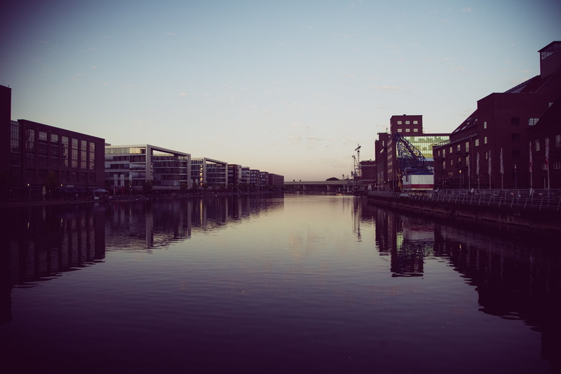pier, clear sky, outdoors, germany, sunset, river, building, dusk, water, connection, reflection, travel, waterfront, famous Place, urban Scene, illuminated
