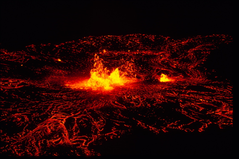 orange color, motion, outdoors, sign, volcano, bonfire, heat - temperature, no people, communication, glowing, lava, flowing, nature, erupting, hot, black background