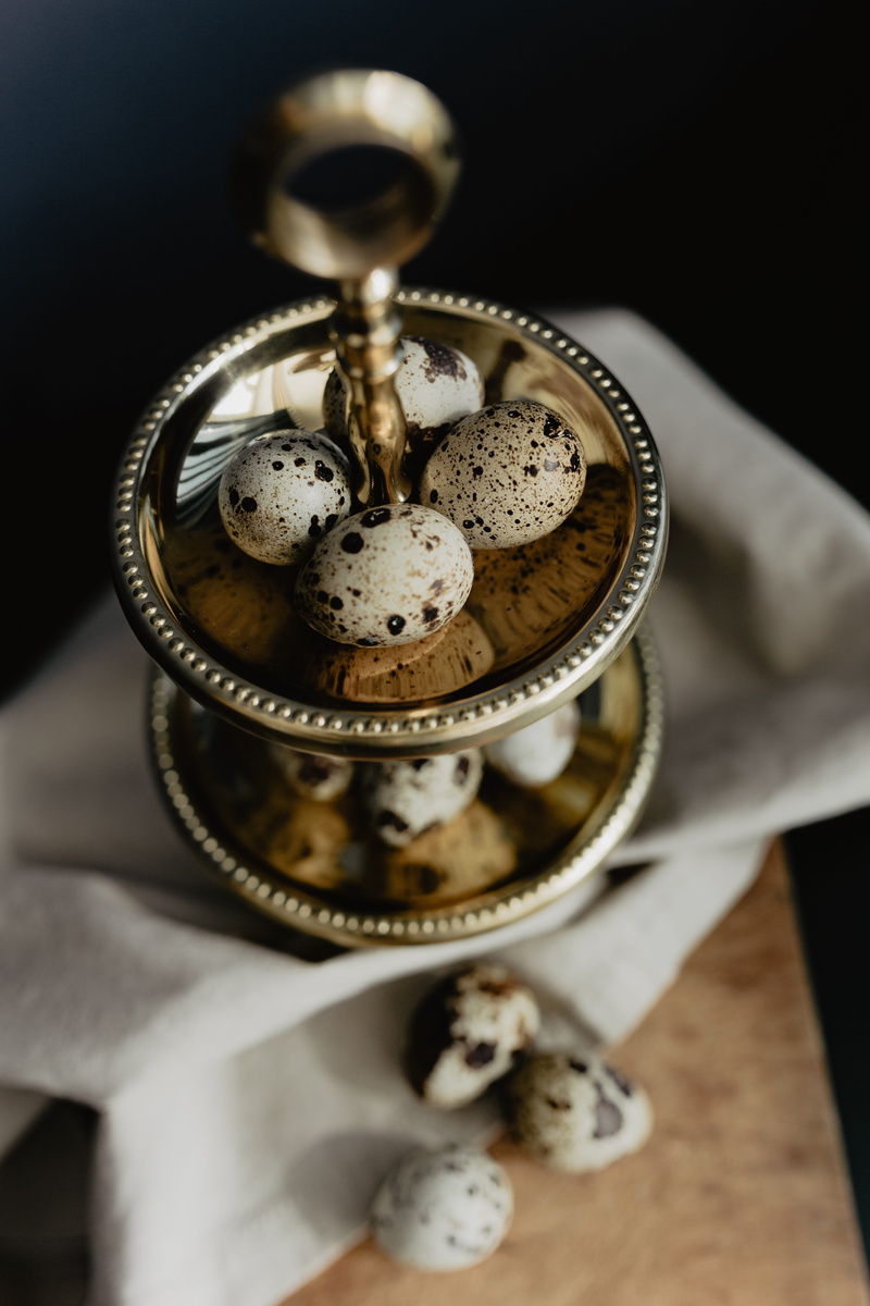 quail, industrial equipment, clock, personal accessory, eggs, easter, metal, machine part, textile, still life, antique, high angle view, watch, equipment