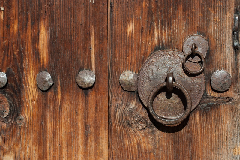 wood - material, wooden, knob, door, architecture, security, door knocker, no people, handle, background, surface, art and craft, closed, antique