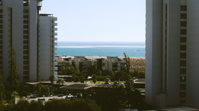 tree, city, horizon, daytime, building Exterior, water, sea, lot, built Structure, cityscape, ocean, architecture And Buildings, luxury, apartment, nature