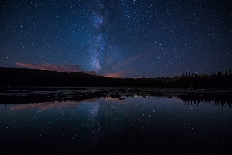 beauty in nature, snowy peak, planet, non-urban scene, mountains, scenics - nature, tranquility, lake, star - space, reflection, space, night, milkway