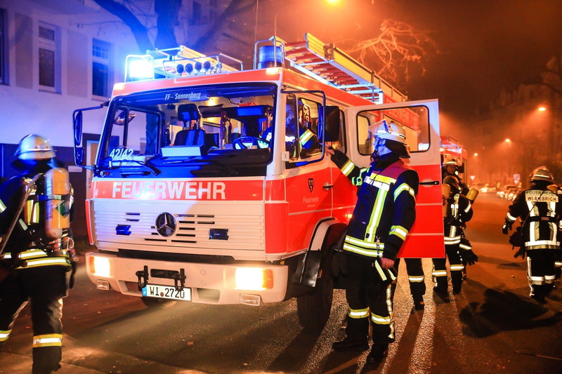 fire engine, street, vehicle, motor vehicle, truck, emergency, illuminated, engine, architecture, text, semi, group of people, 720P, road, outdoors, firetruck