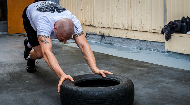 tyre, strength, sports equipment, healthy lifestyle, sport, people, men, weight training, muscular build, real people, taco fleur, wheel, hardcore training