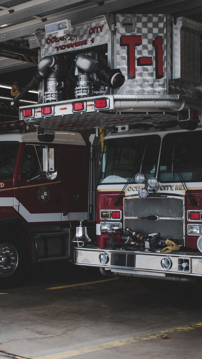 land vehicle, firefighter, city, occupation, fire engine, emergency services occupation, rescue, day, mode of transportation, architecture, car, street