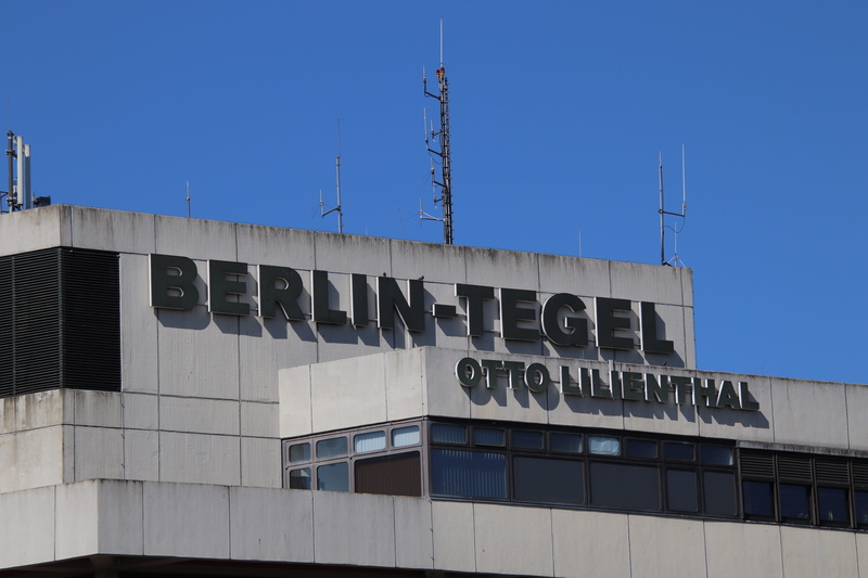 wall - building feature, outdoors, text, day, central airport, communication, germany, go away, low angle view, travel, architecture, no people, western script