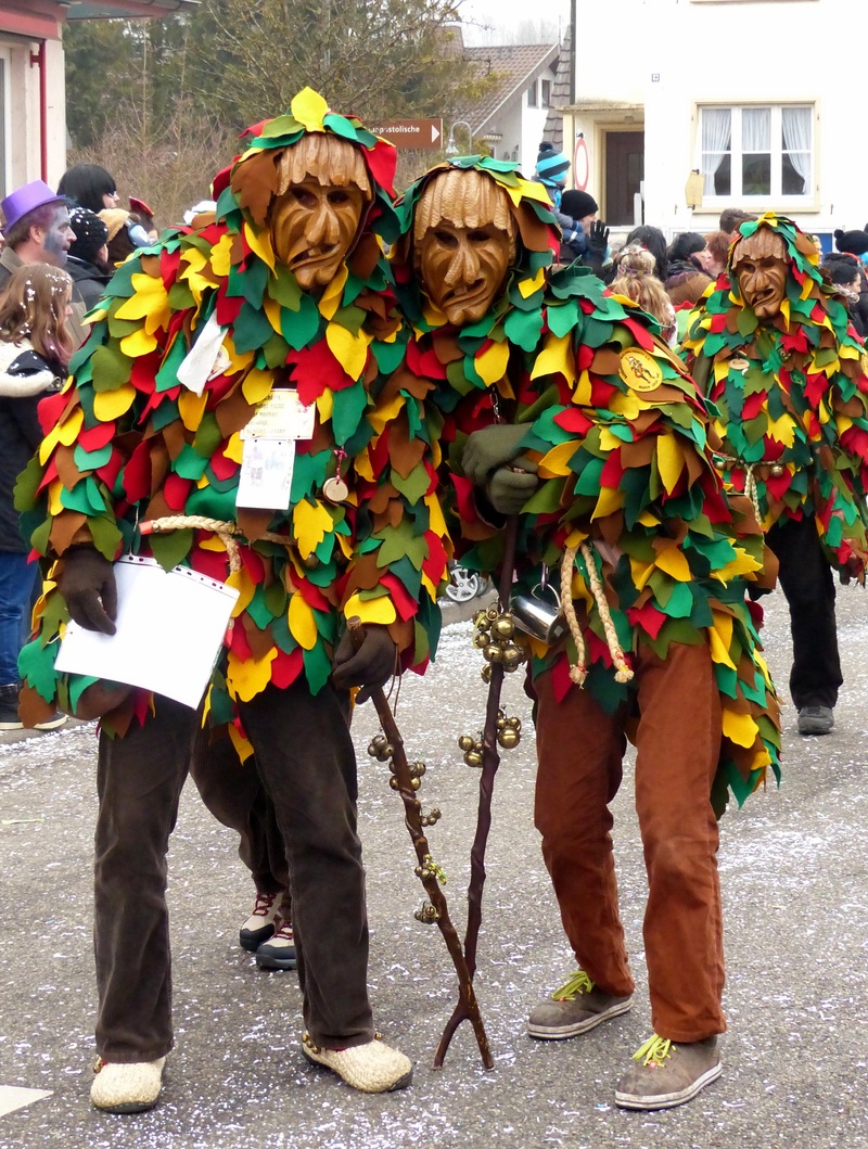 clothing, togetherness, day, leisure activity, 2K, street, celebration, lifestyles, wooden mask, women, men, multi colored, guild group, city, real people
