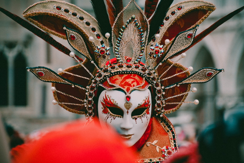 wear, feather, celebration, day, orange, white, obscured face, red, person, representation, masquerade, focus on foreground, wearing, ornate, 4K, arts culture and entertainment
