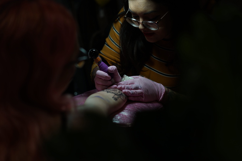 5K, women, tattoo, human body part, human hand, craft, hand, girl, skill, sweater, dark, expertise, artist, art and craft, tattooing, indoors, adult, orange