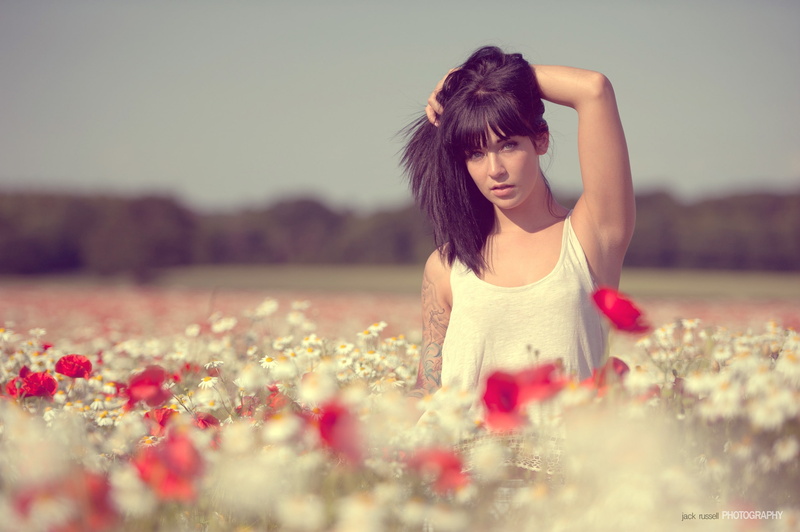 Jack Russell, flower, hands in hair, beauty, adult, nature, land, hairstyle, young adult, contemplation, tattoo, outdoors, field, human arm, beautiful woman