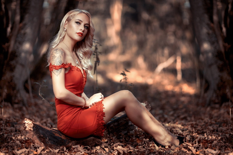 face, strapless, red lipstick, tattoo, looking at camera, mouth, girl, forest, lips, photo, depth of field, freckles, bare shoulders, wavy hair, 1080P