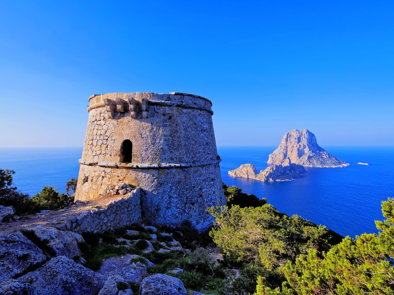horizon, history, beauty in nature, blue, scenics - nature, nature, tranquility, sky, the past, rock formation, clear sky, sea, day, built structure, Ibiza