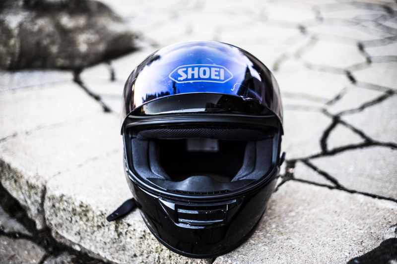 western script, shoei, focus on foreground, protection, headwear, day, helmet, sports helmet, safety, black, close-up, 5K, top, law, security, helm, fragment
