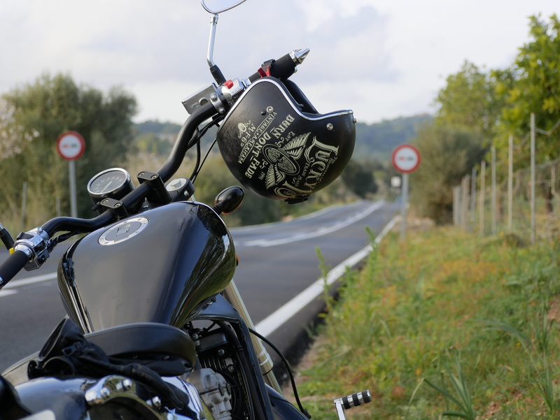 helmet, day, bicycle, metal, no people, tree, tank, leonart motors, travel, handlebar, mode of transportation, motorcycle, focus on foreground, transportation