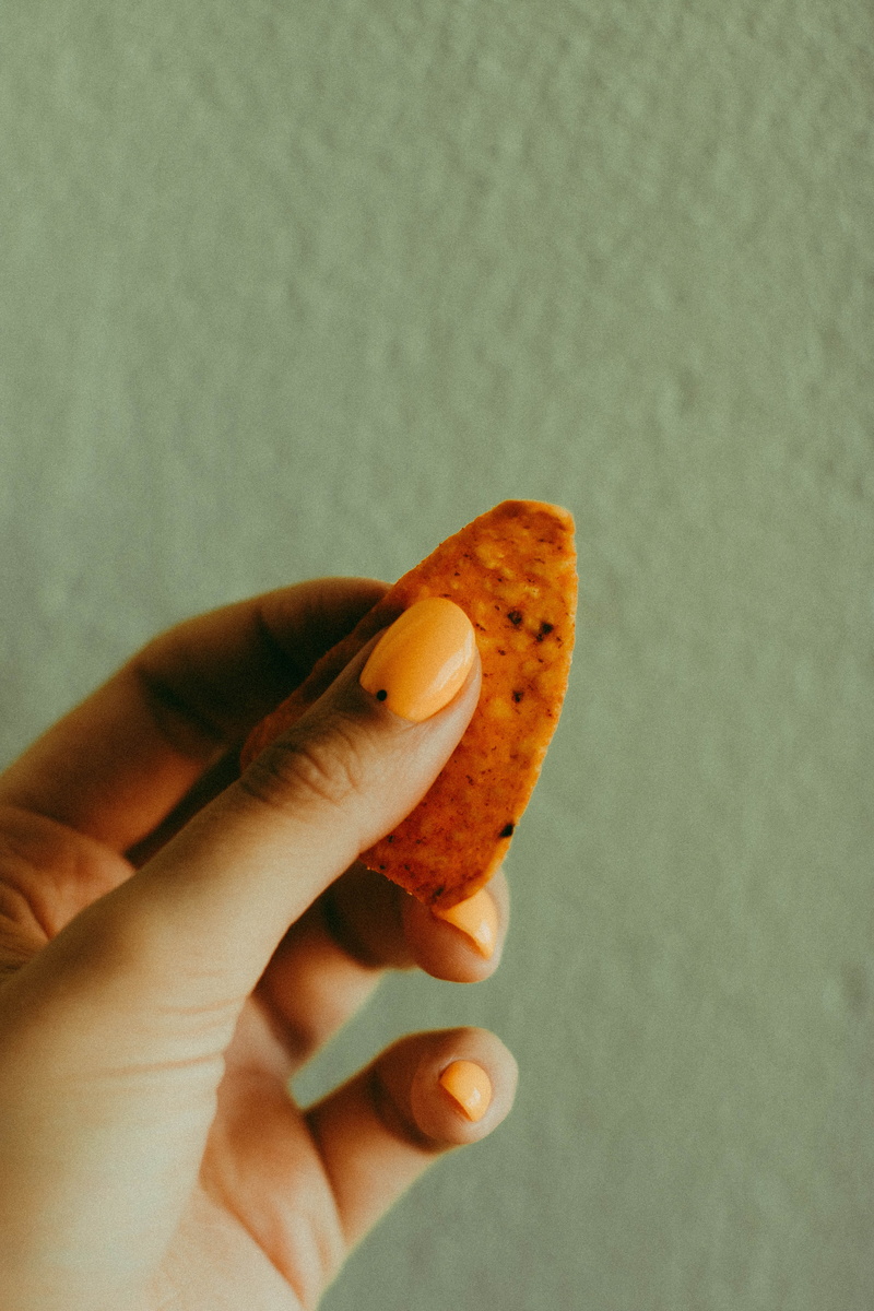 person, human hand, orange, human body part, freshness, lifestyles, missing bite, finger, hand, real people, unrecognizable person, healthy eating, 5K